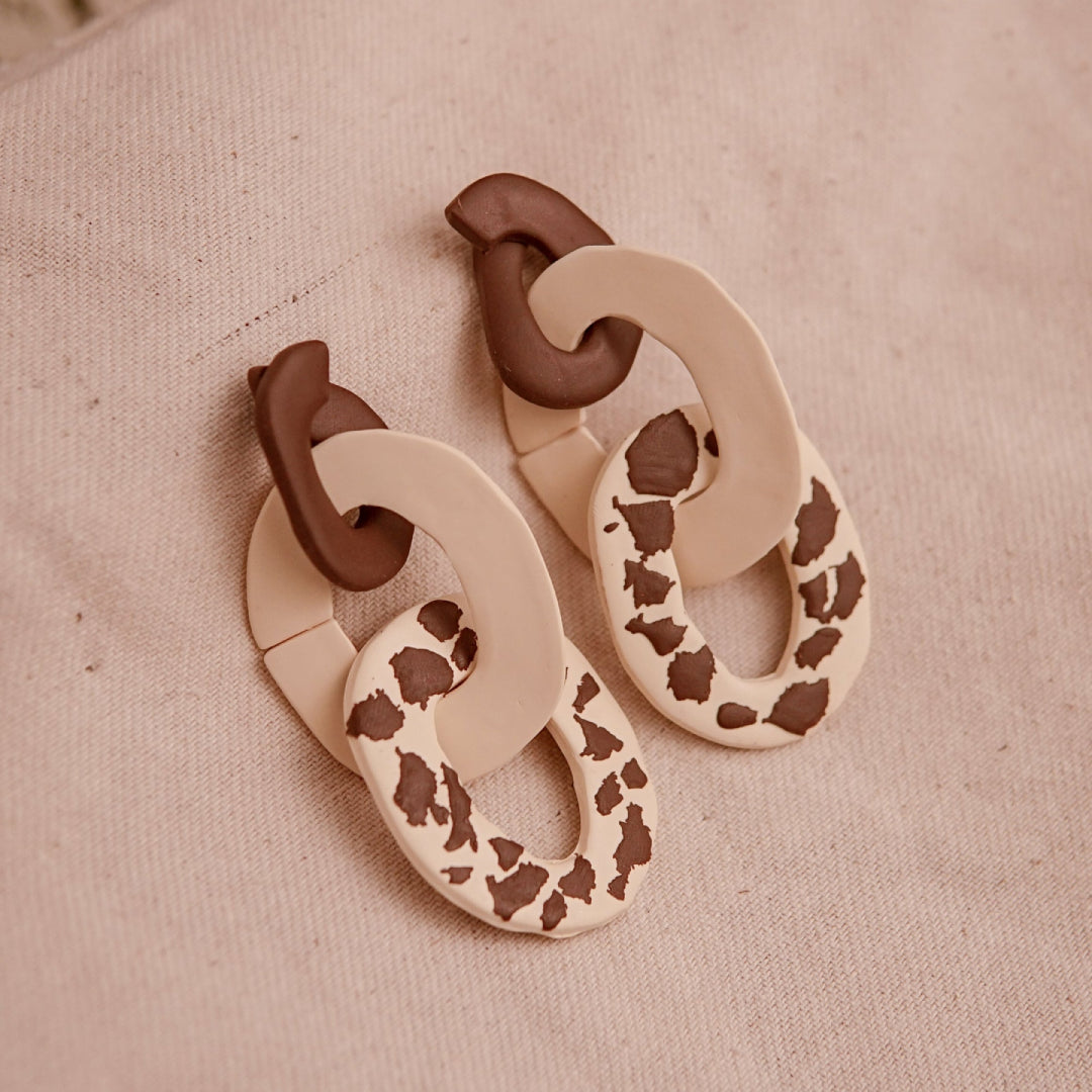 Aretes Lau Pantoja Cow Print