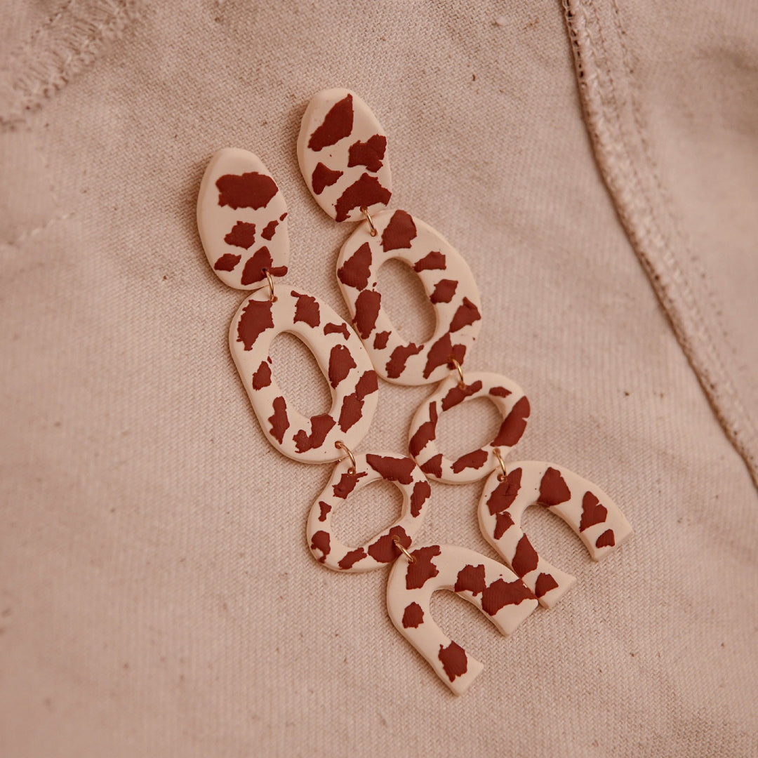 Aretes Anni Cow Print