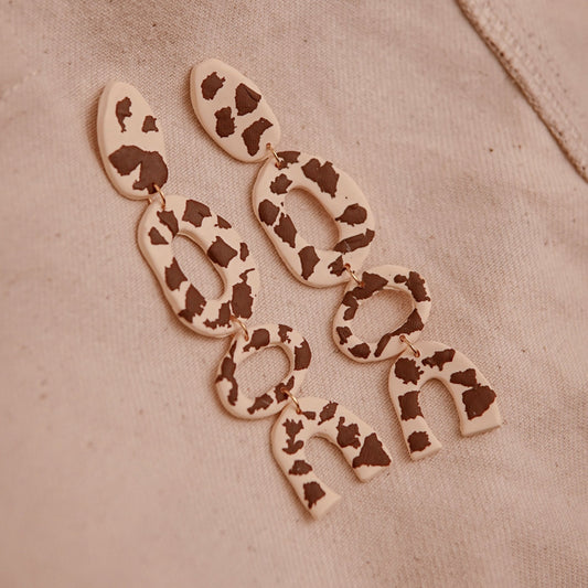 Aretes Anni Cow Print