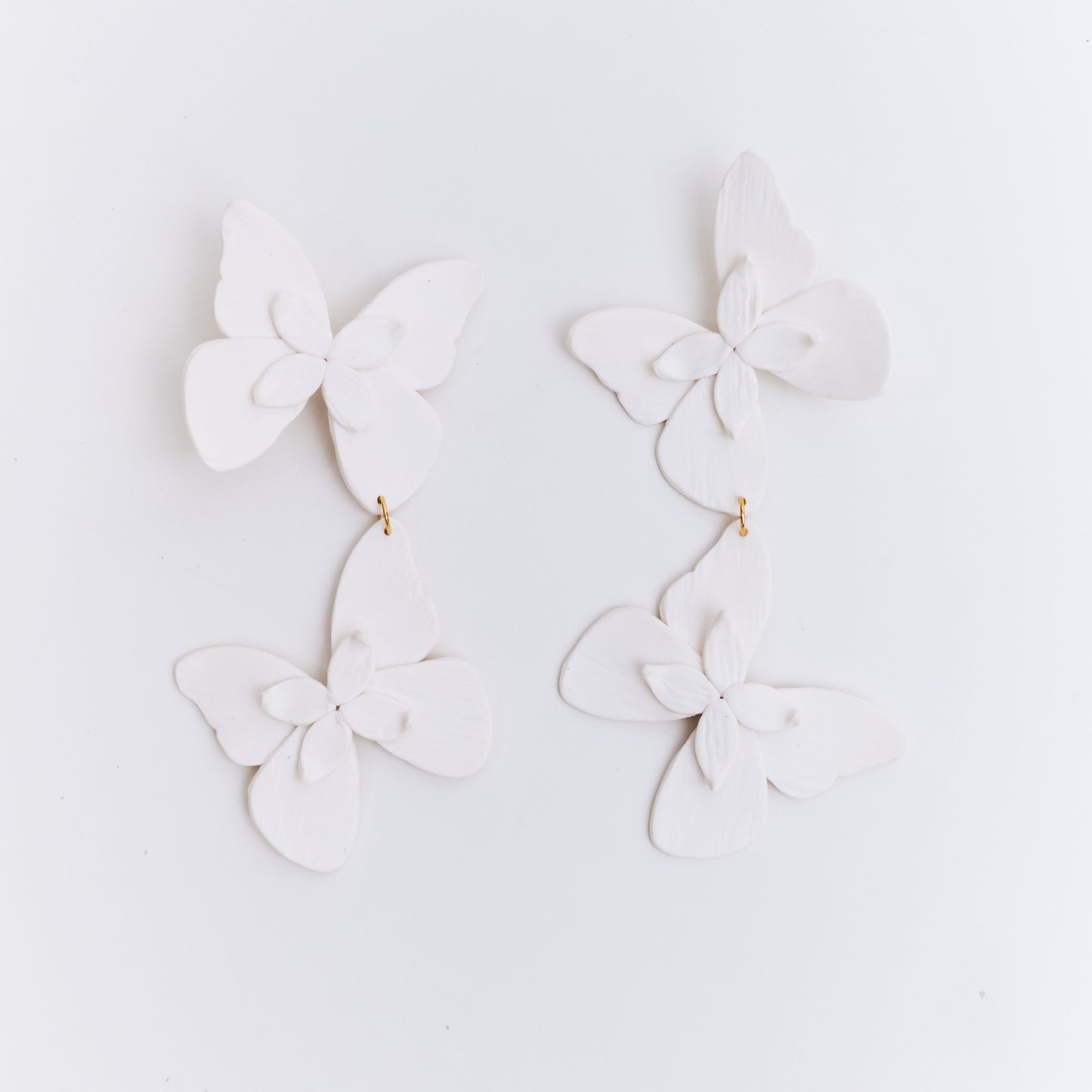 Aretes Alas en Flor Doble