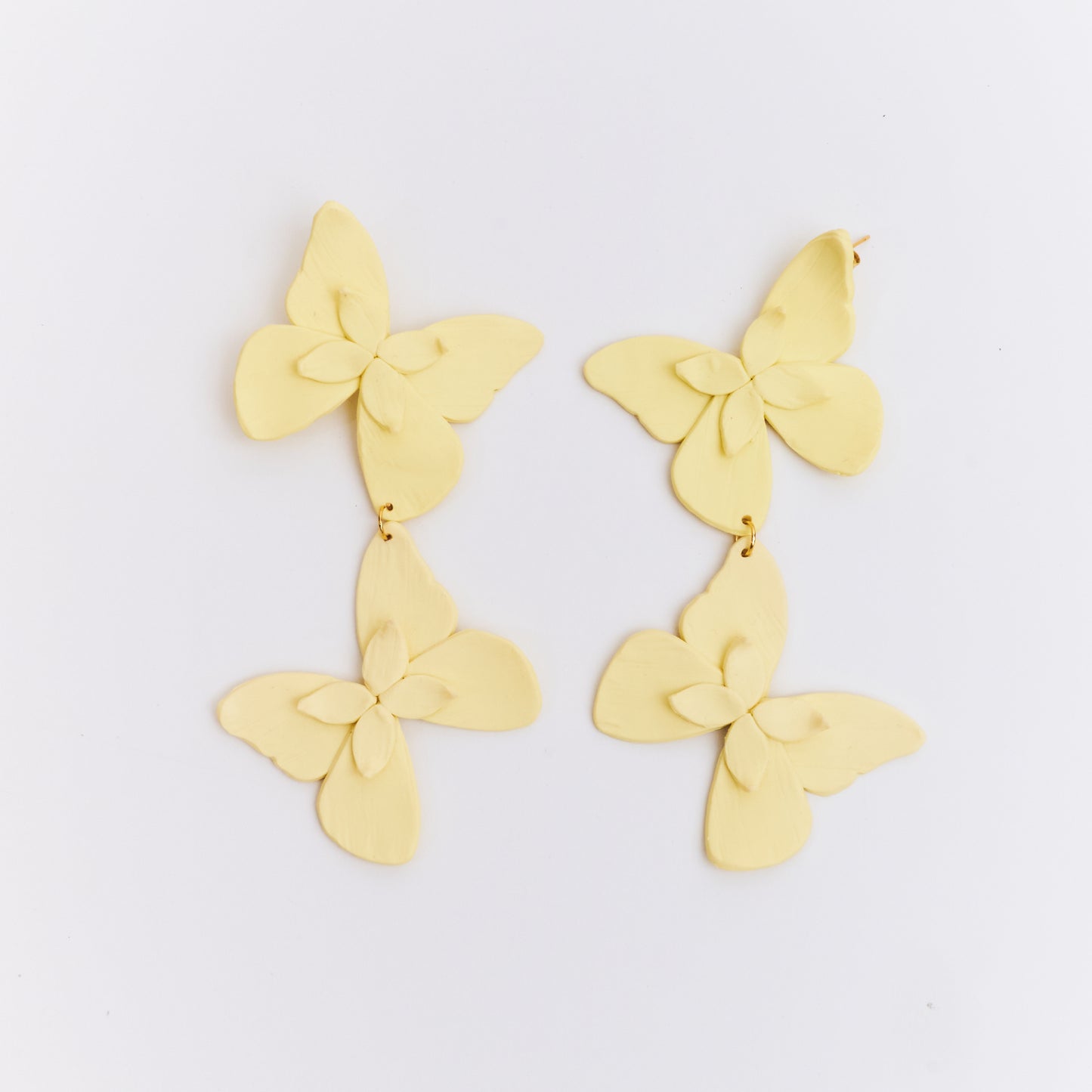 Aretes Alas en Flor Doble