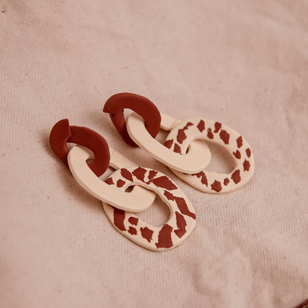 Aretes Lau Pantoja Cow Print