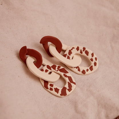Aretes Lau Pantoja Cow Print