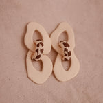 Aretes Iris Cow Print