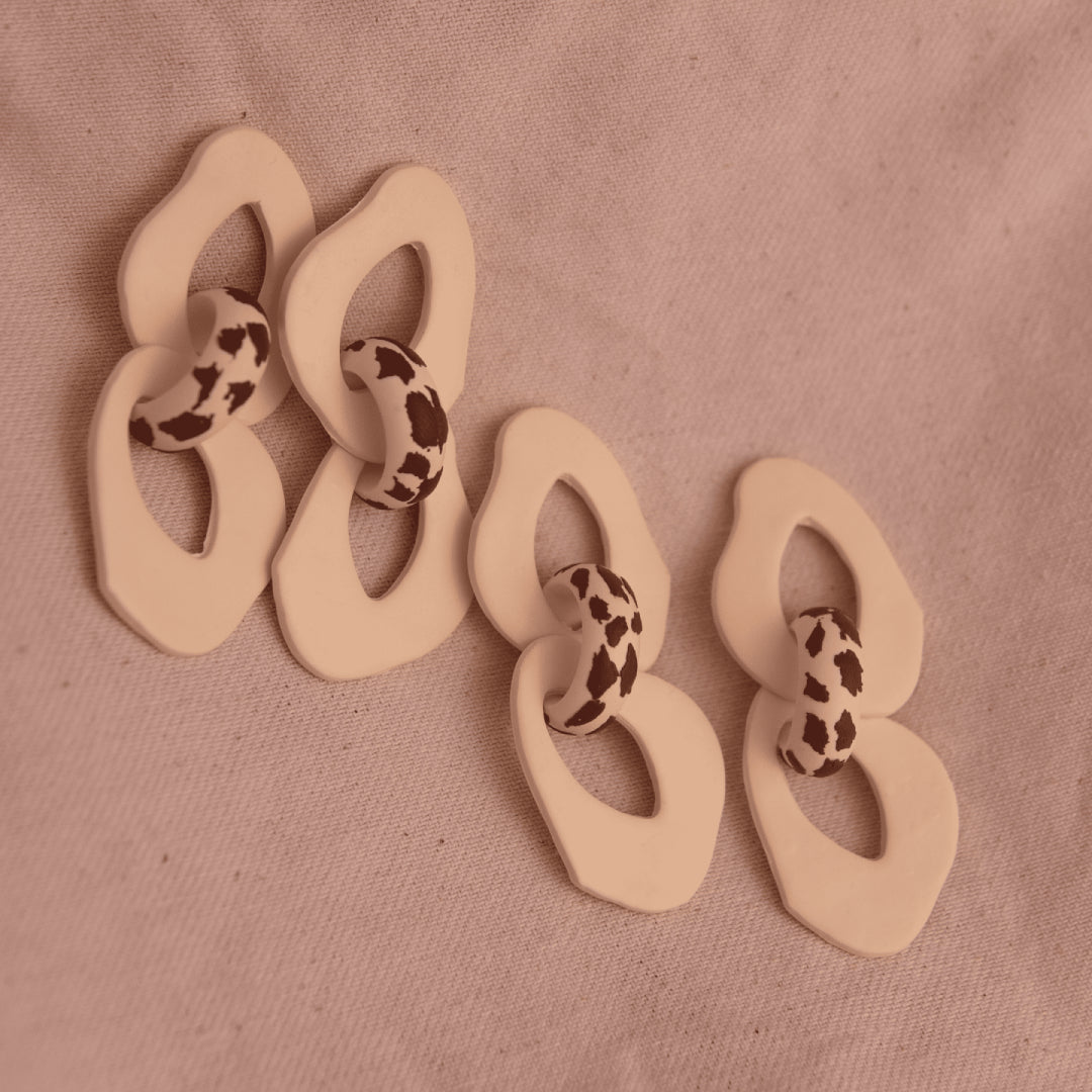 Aretes Iris Cow Print