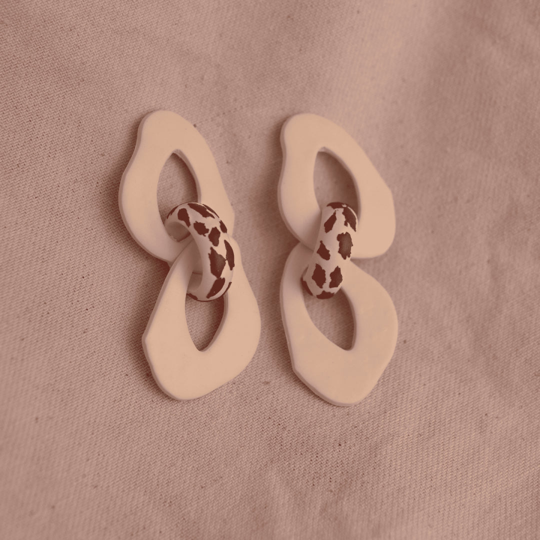 Aretes Iris Cow Print