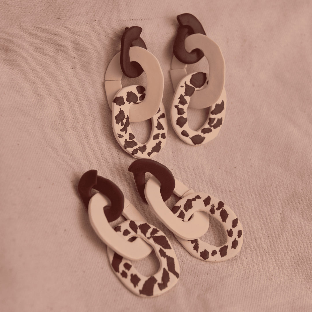 Aretes Lau Pantoja Cow Print