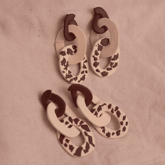 Aretes Lau Pantoja Cow Print