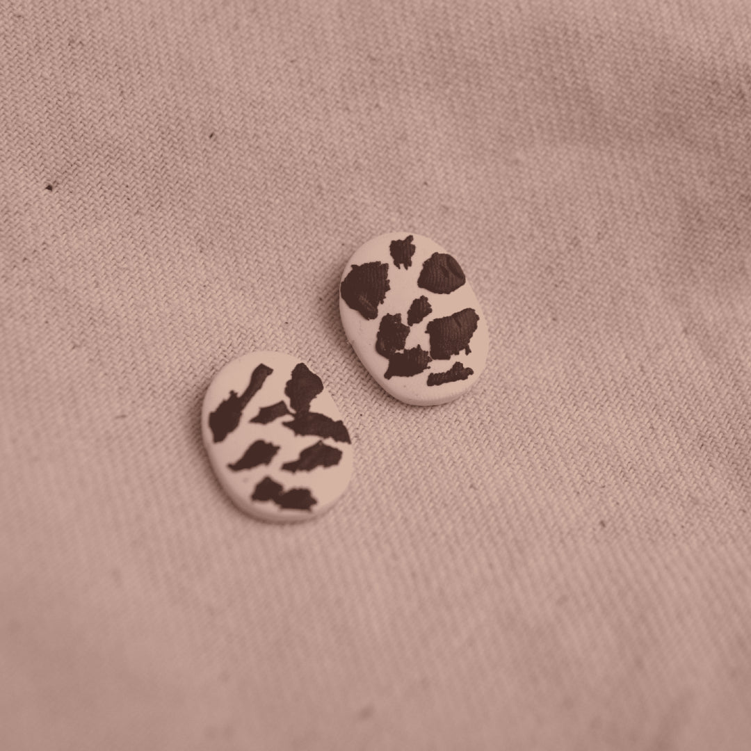 Topos Circulos Cow Print
