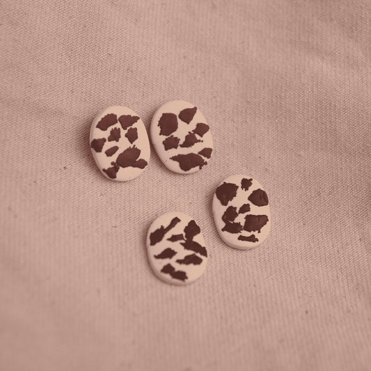 Topos Circulos Cow Print